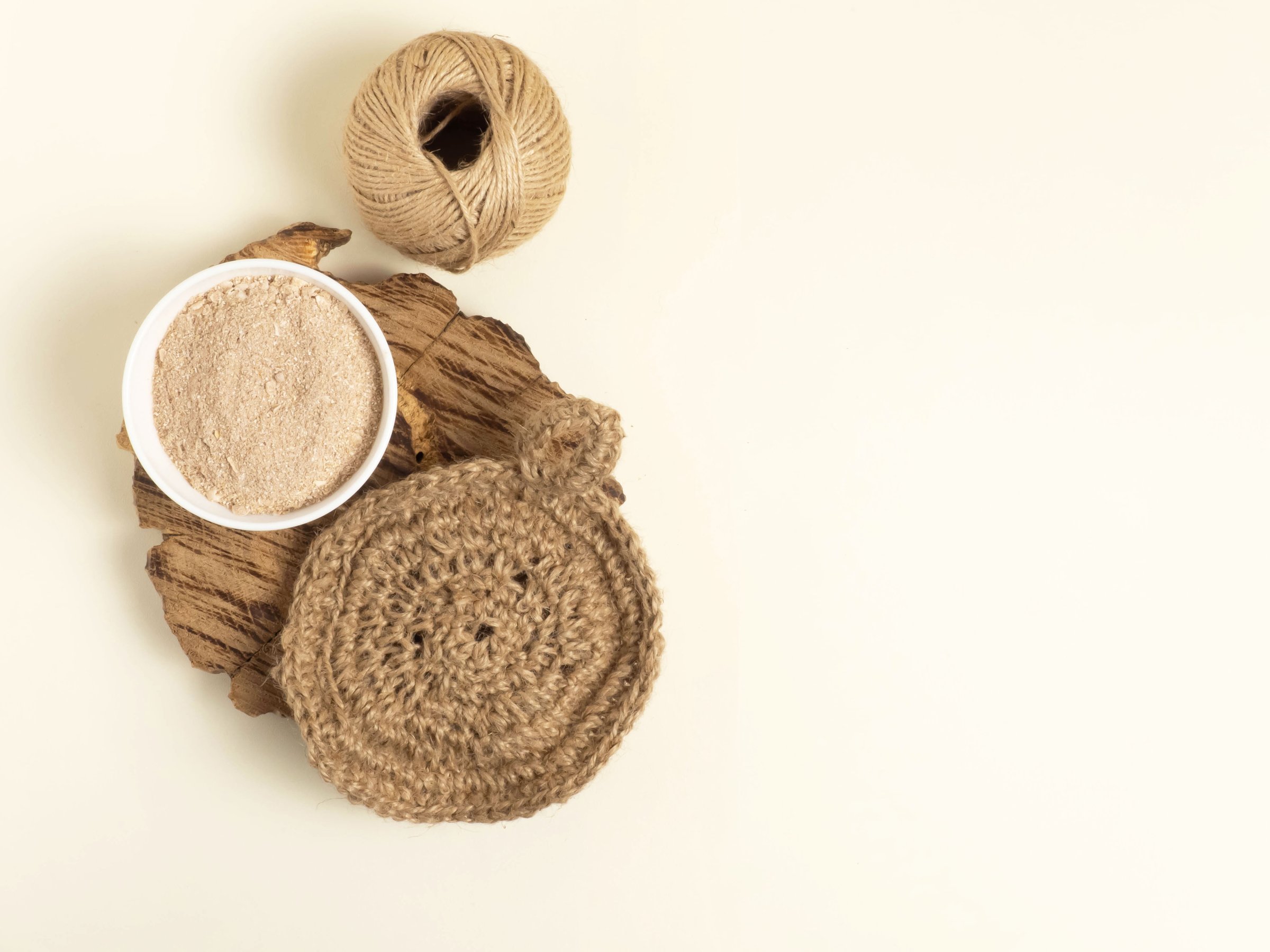 Natural jute sponge for body wash natural cleanser for the body from the oatmeal. The concept of zero waste Flat lay.