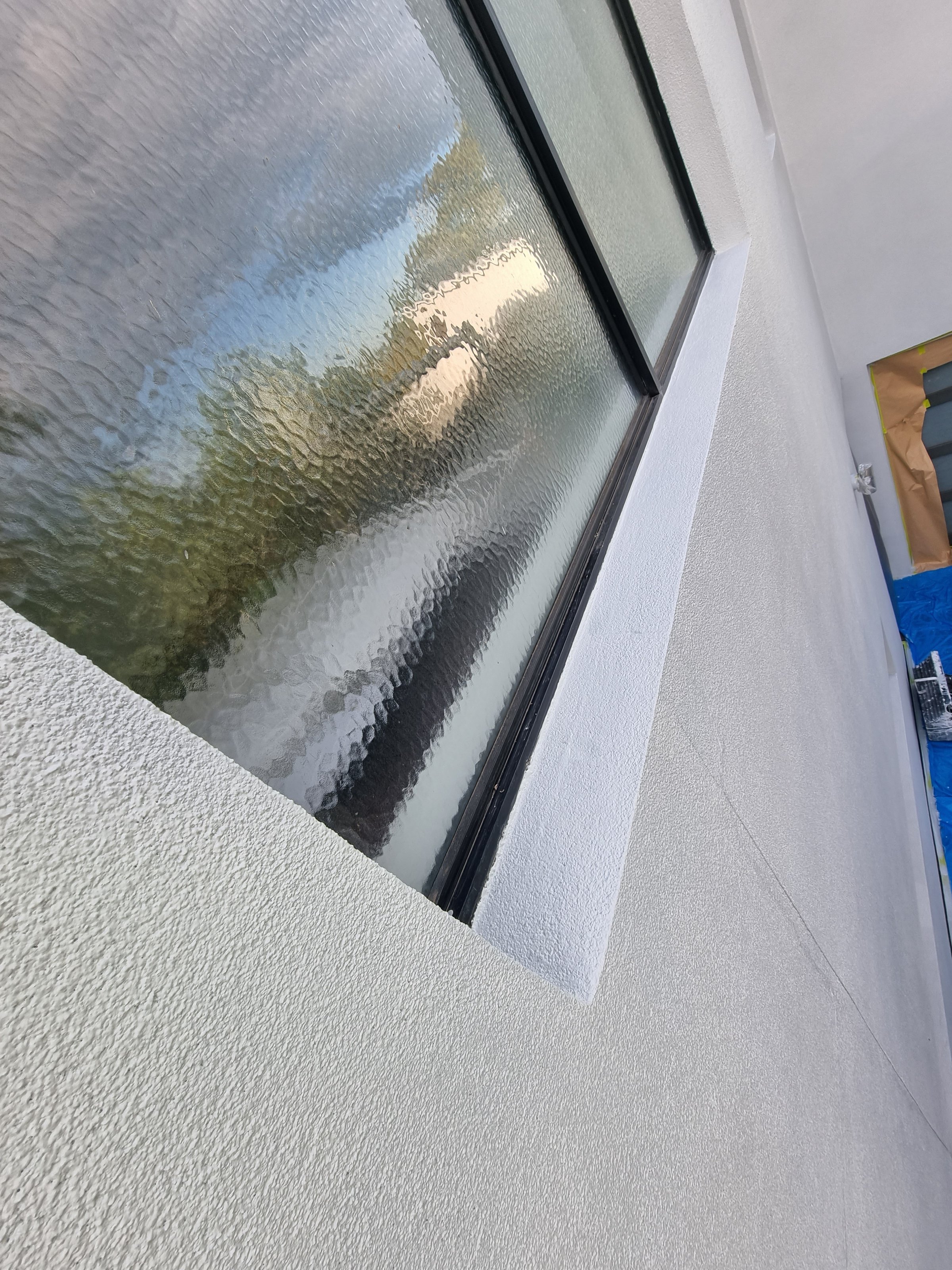 Rendered cladding after restoration - additional angle