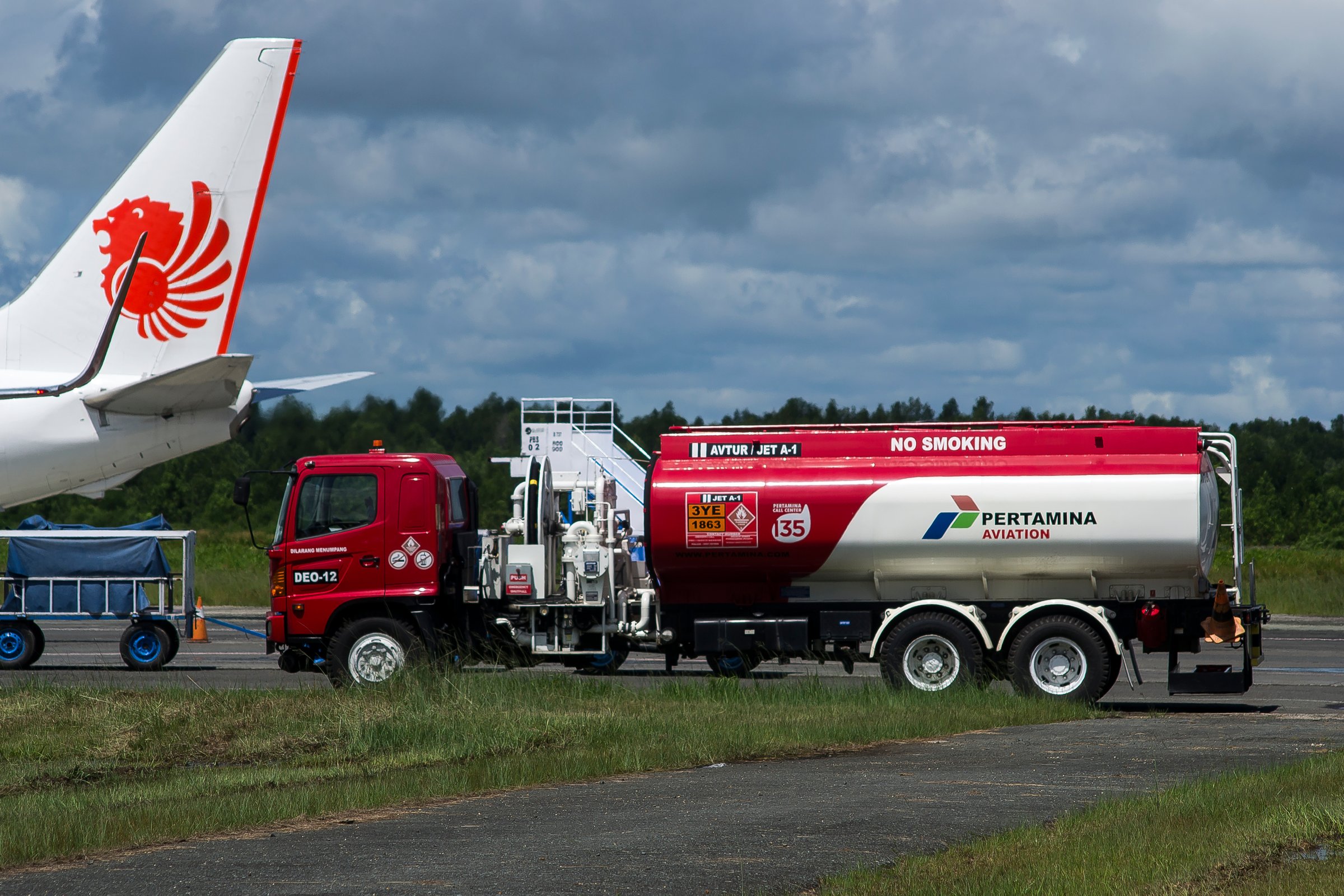 Sorong, Southwest Papua, Indonesia, 06/19/2021. The ground engineers are preparing the commercial plane before departure.