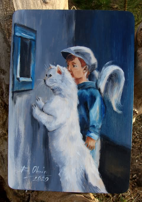 Aniołek z kotem w oknie