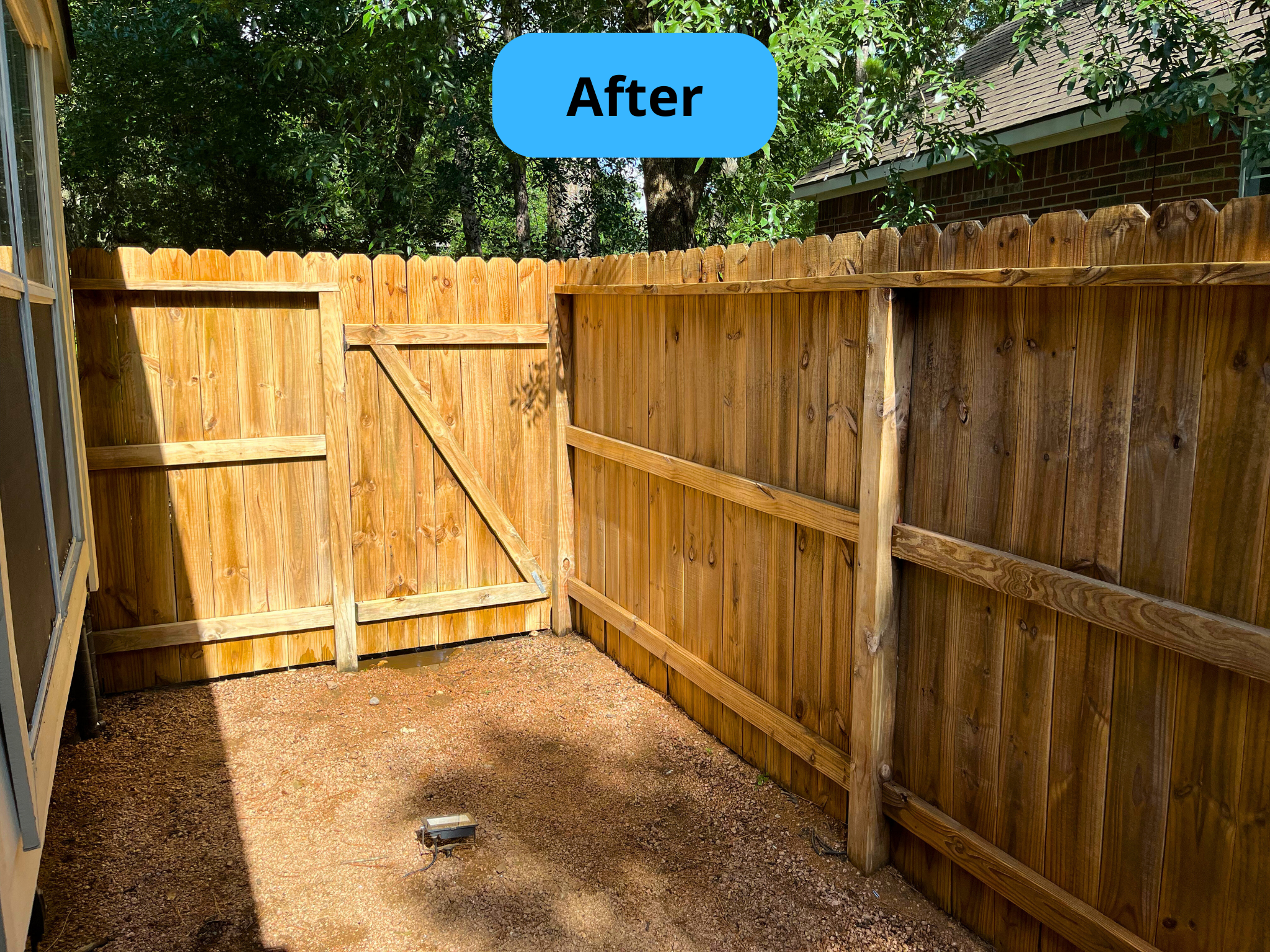 Fence after pressure washing showing pristine clean results