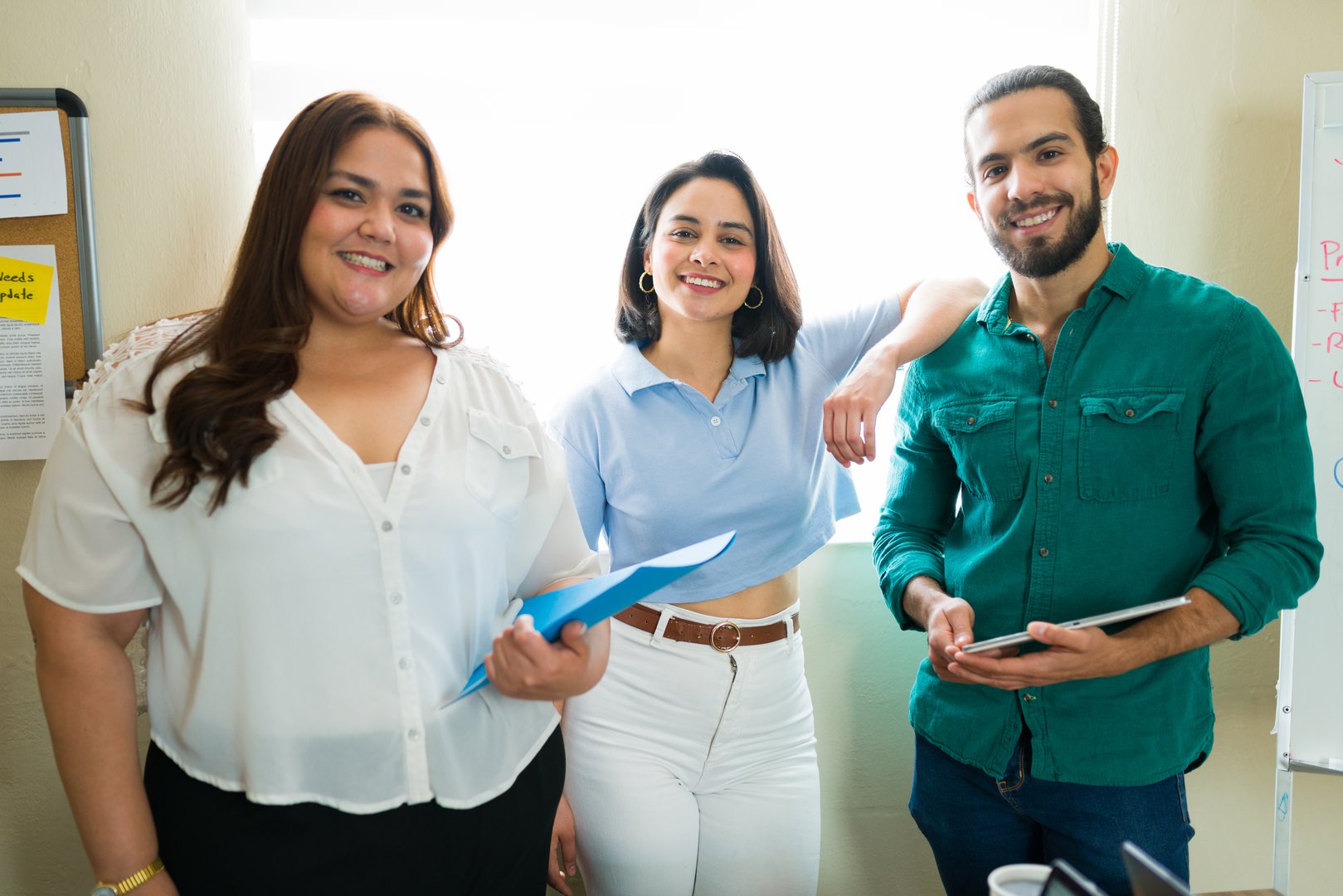 Portrait of three smiling business colleagues