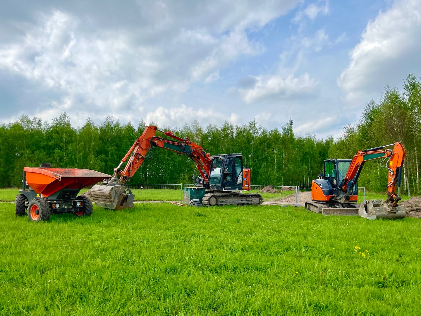 Mini crawler excavator for laying utilities on construction sites.