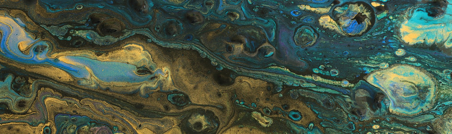 art photography of abstract marbleized effect background with turquoise, green, black and gold creative colors. Beautiful paint.