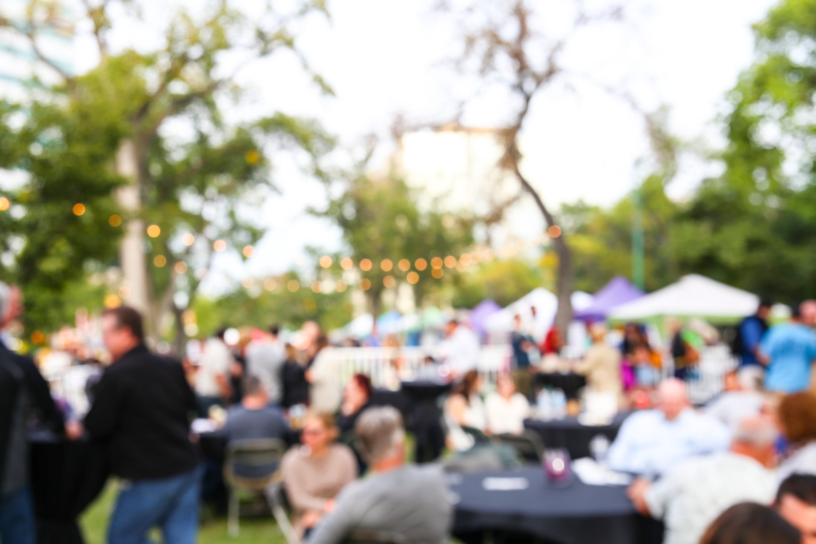 Unfocused open-air party background