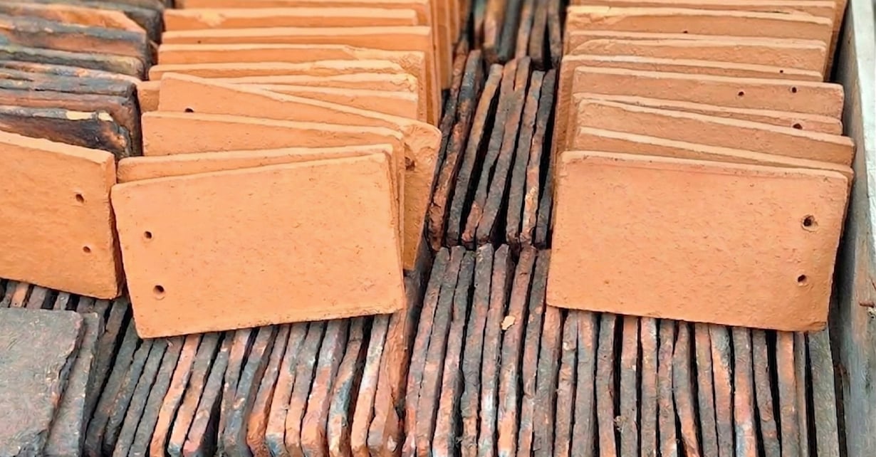 Laser rust cleaning reclaimed clay tiles restoration