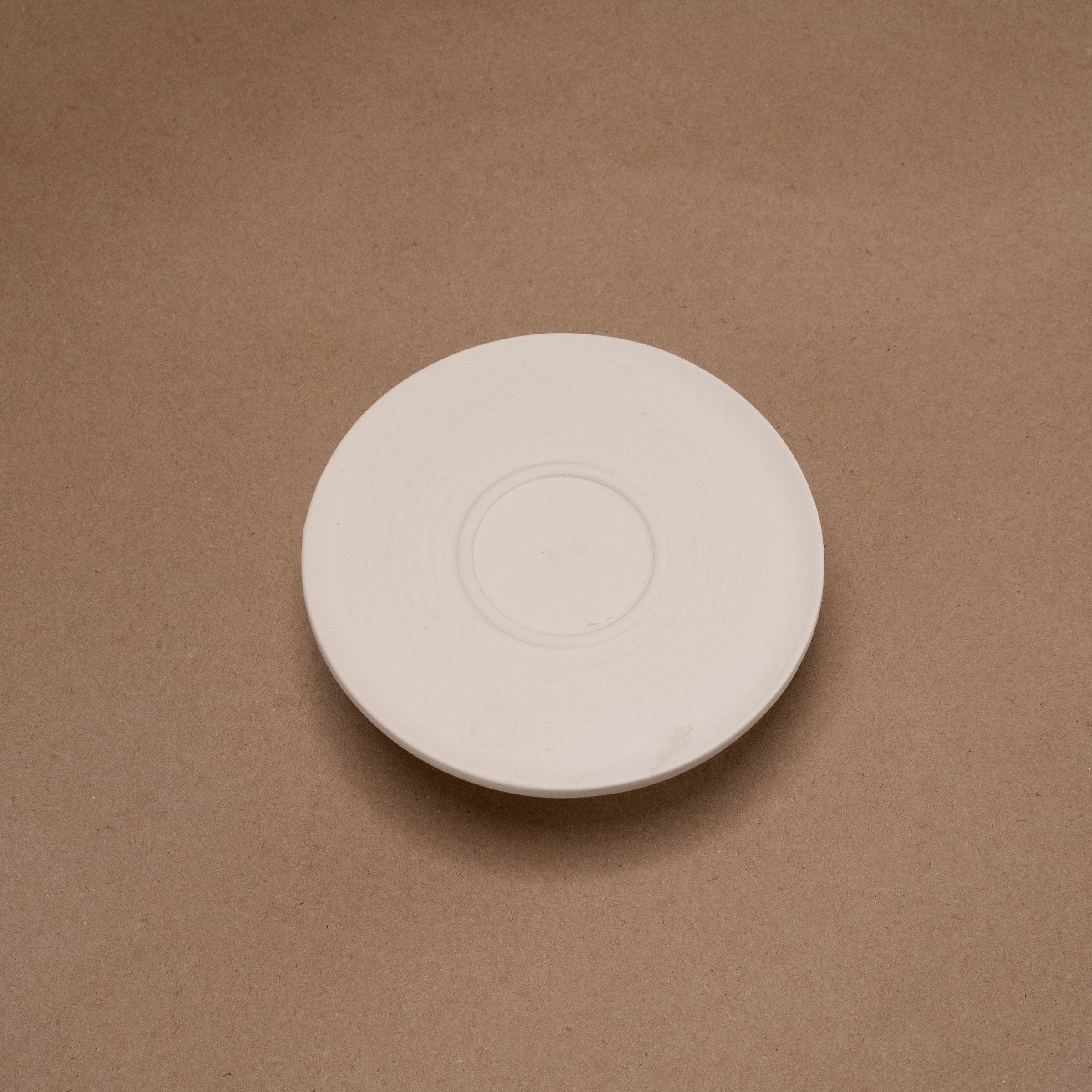 Platos complementarios de cerámica Naidich