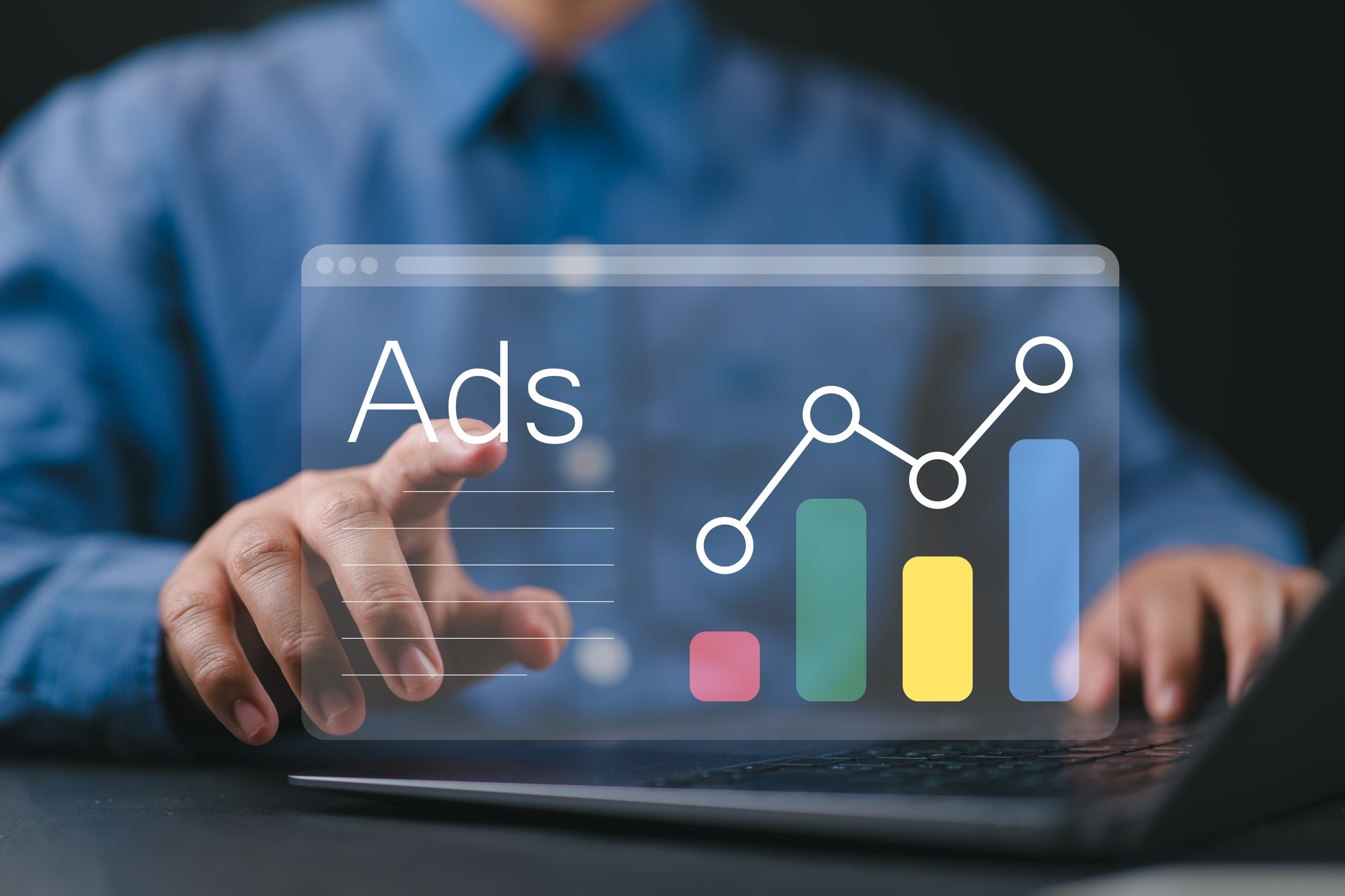 Ad on website and social media, banner ads on internet, Digital marketing concept. Marketer analyzing online advertising campaigns and performance metrics on a laptop with a graphical data interface.