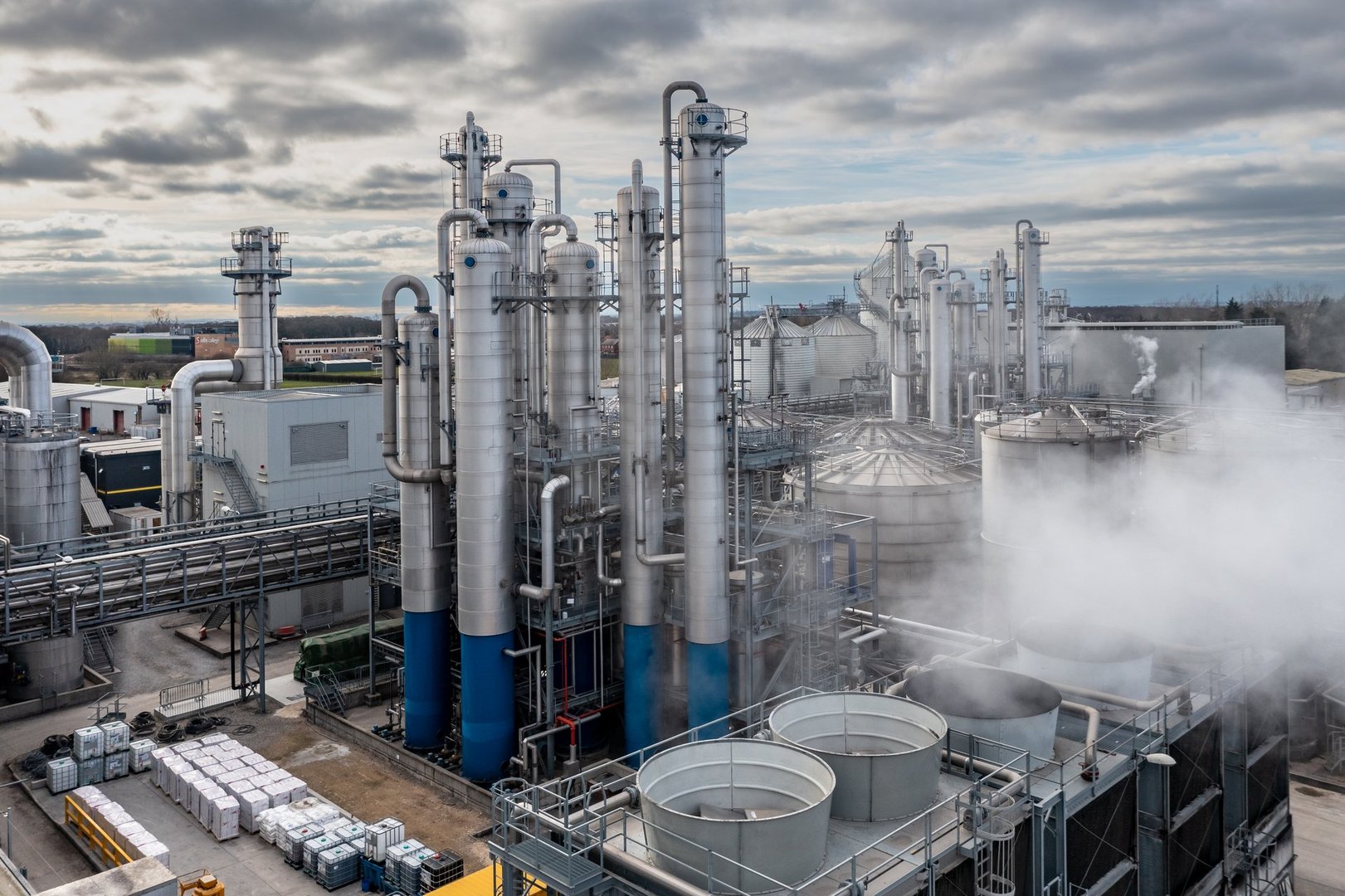 Aerial view of a food manufacturing site with heat exchangers and cooling fans making starch, sweeteners and alcohol for the food industry
