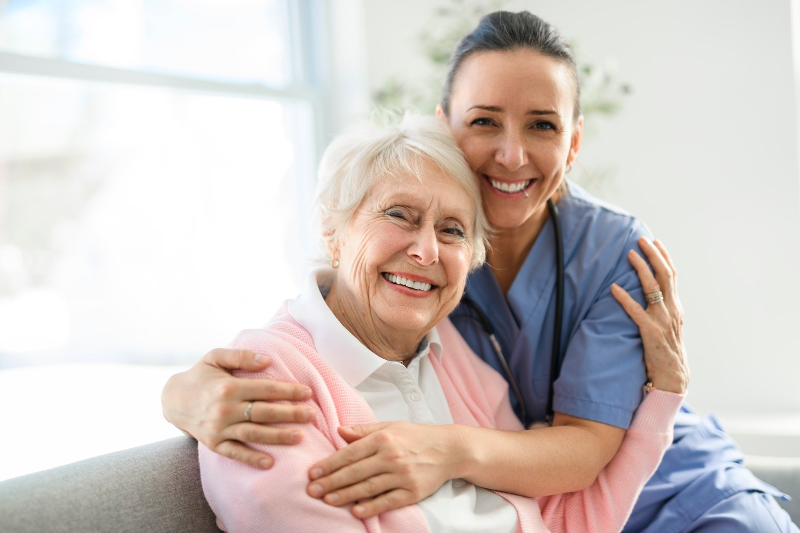 Nurse with senior patient at home