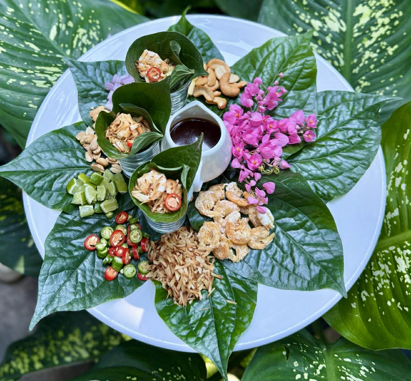 Miang Kham - Traditional Thai leaf wraps with savory-sweet filling