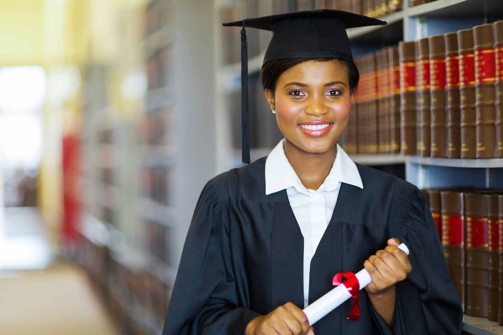pretty african university law school graduate on graduation day