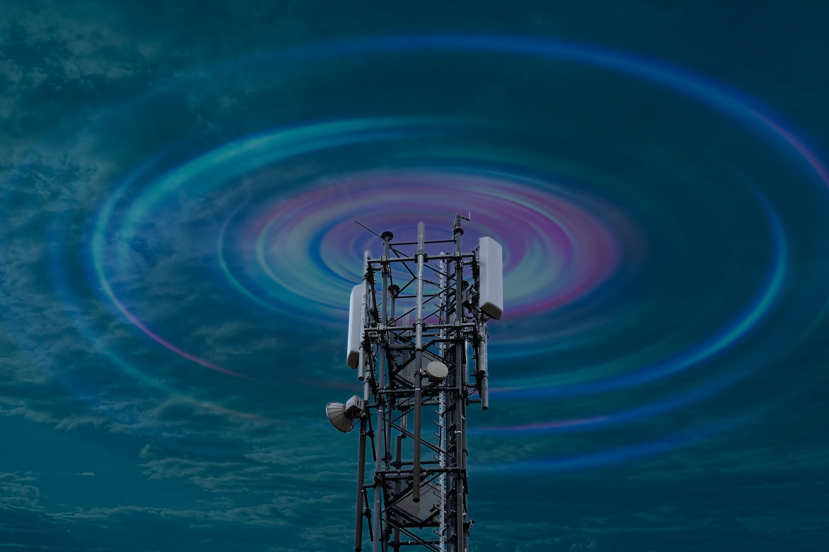 Close-up of an antenna mast with many different antennas for mobile communication, global network, data transfer. The Global Network is simulated with transparent symbols.