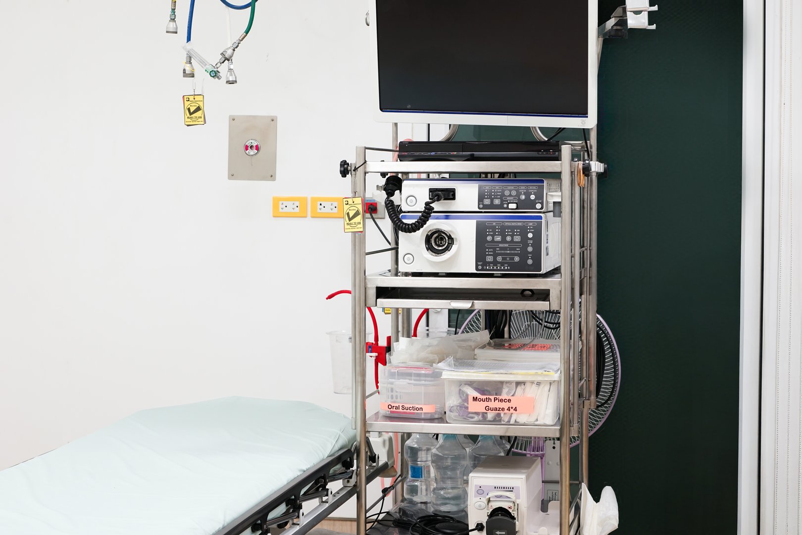 Inside a specialized endoscopic room, advanced medical technology awaits. Symbolizing precise diagnostics, hospital infrastructure, and clinical efficiency.