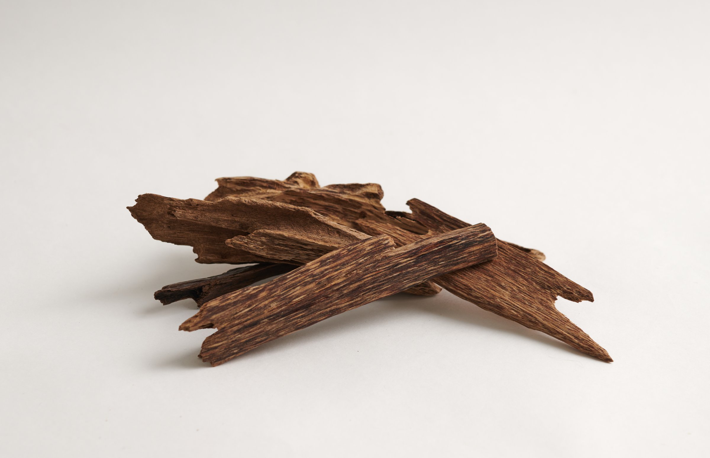 Scented Agarwood Sticks isolated on white background  Highly Valued in Traditional and Spiritual Practice