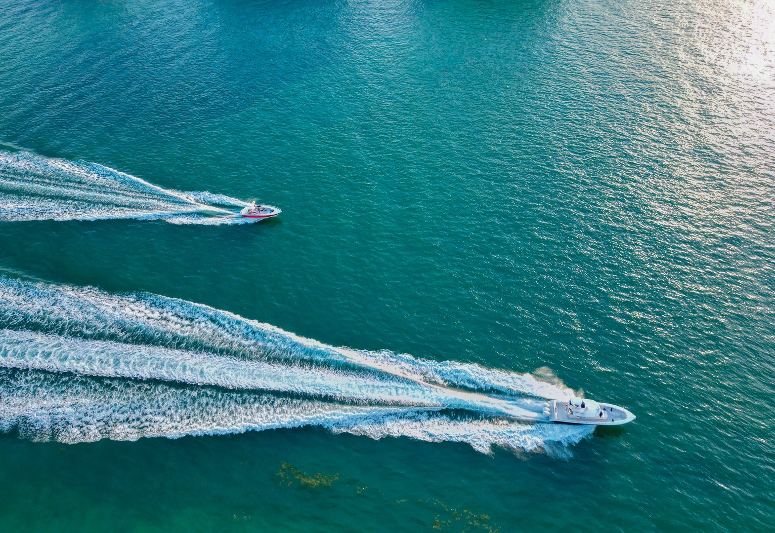 Luxury boat motor yacht. Luxury yacht in sea top view. Boating and yachting tourism. Luxurious lifestyle. Vacations on summer. Yacht at sea. Sea vacation on summer. Travel by sea. Sailing the ocean.