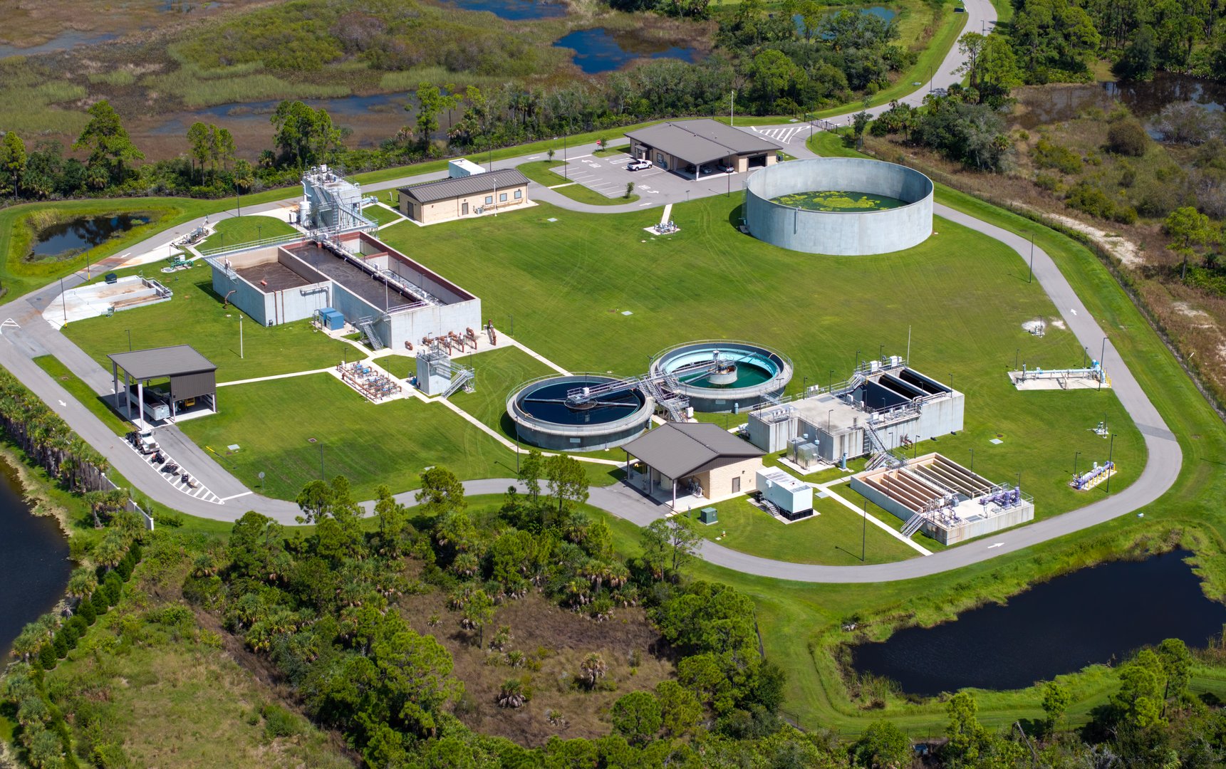Water treatment facility with multiple tanks and filtration units. Vital infrastructure for sustainable water management and distribution.