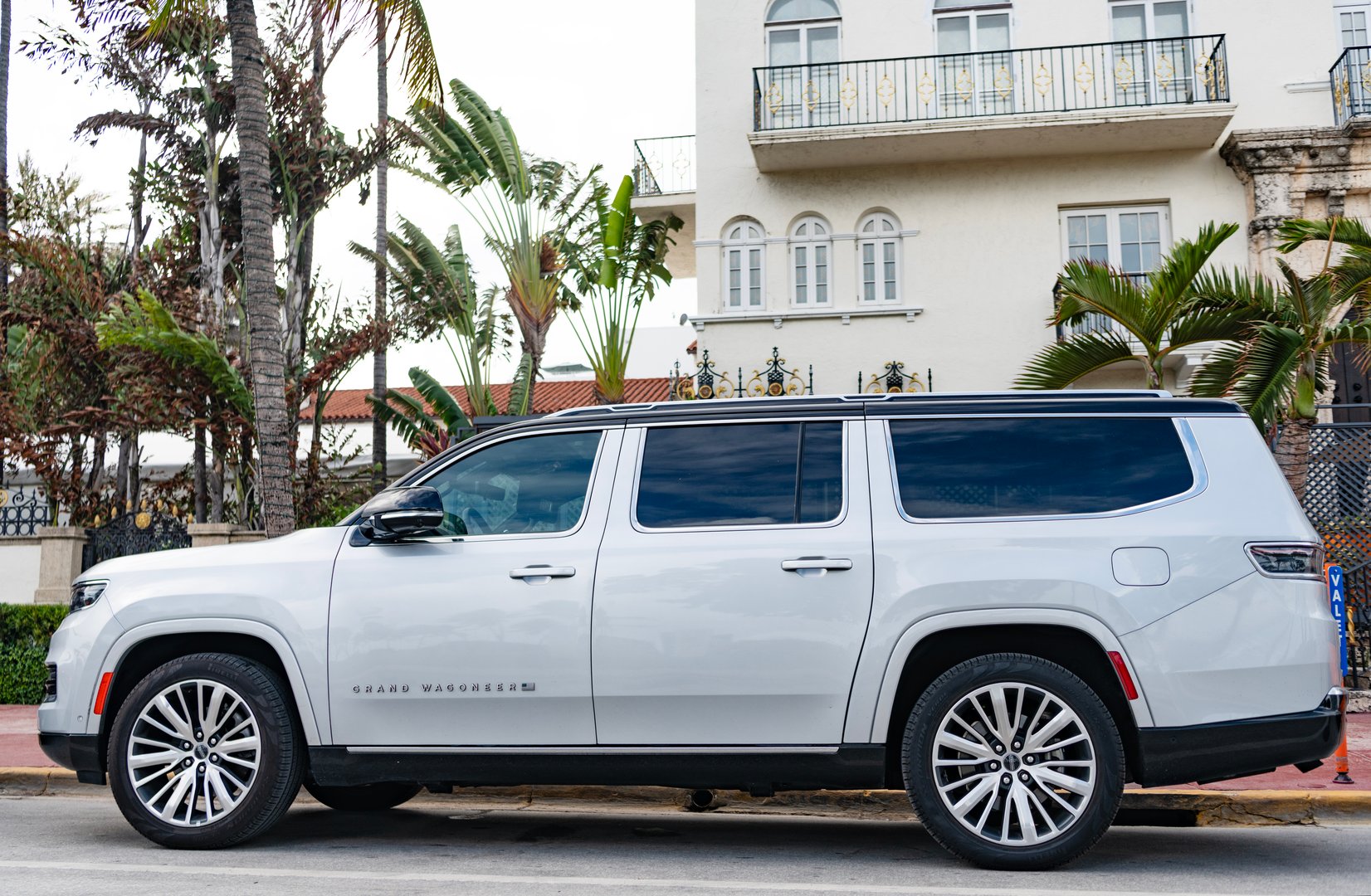 Miami, Florida, USA - December 16, 2024: Jeep Grand Wagoneer 2024 SUV car. Luxury SUV car of Grand Wagoneer. Car of Grand Wagoneer parked outdoor. Grey Grand Wagoneer, side view.