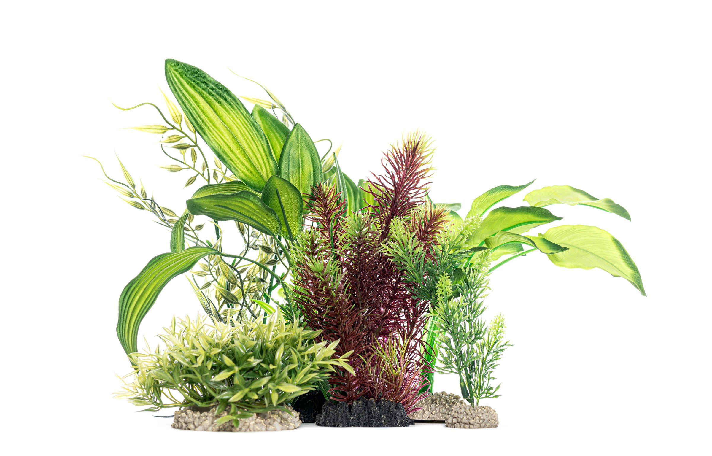 Colorful plastic aquarium plants creating an underwater seascape on a white background