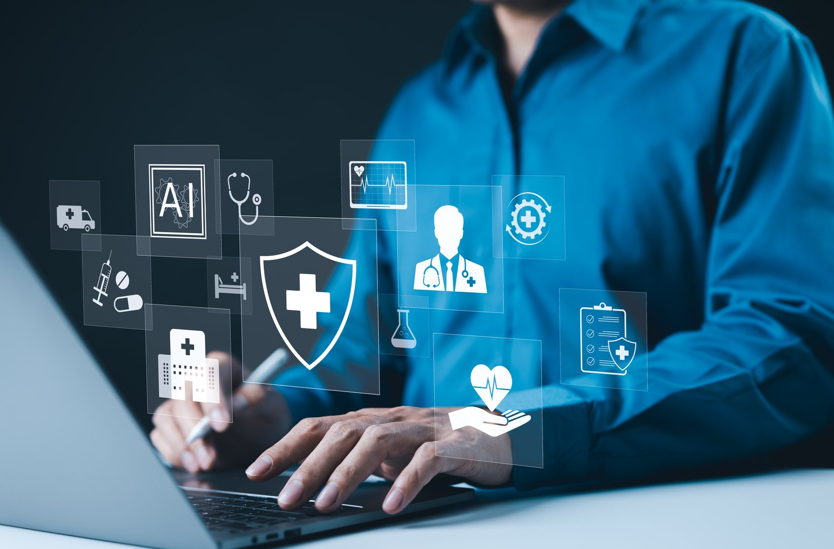 AI-Driven Healthcare and Medical Technology Concept. A professional using laptop with digital AI powered healthcare icons, medical services, data protection, and healthcare technology advancements.