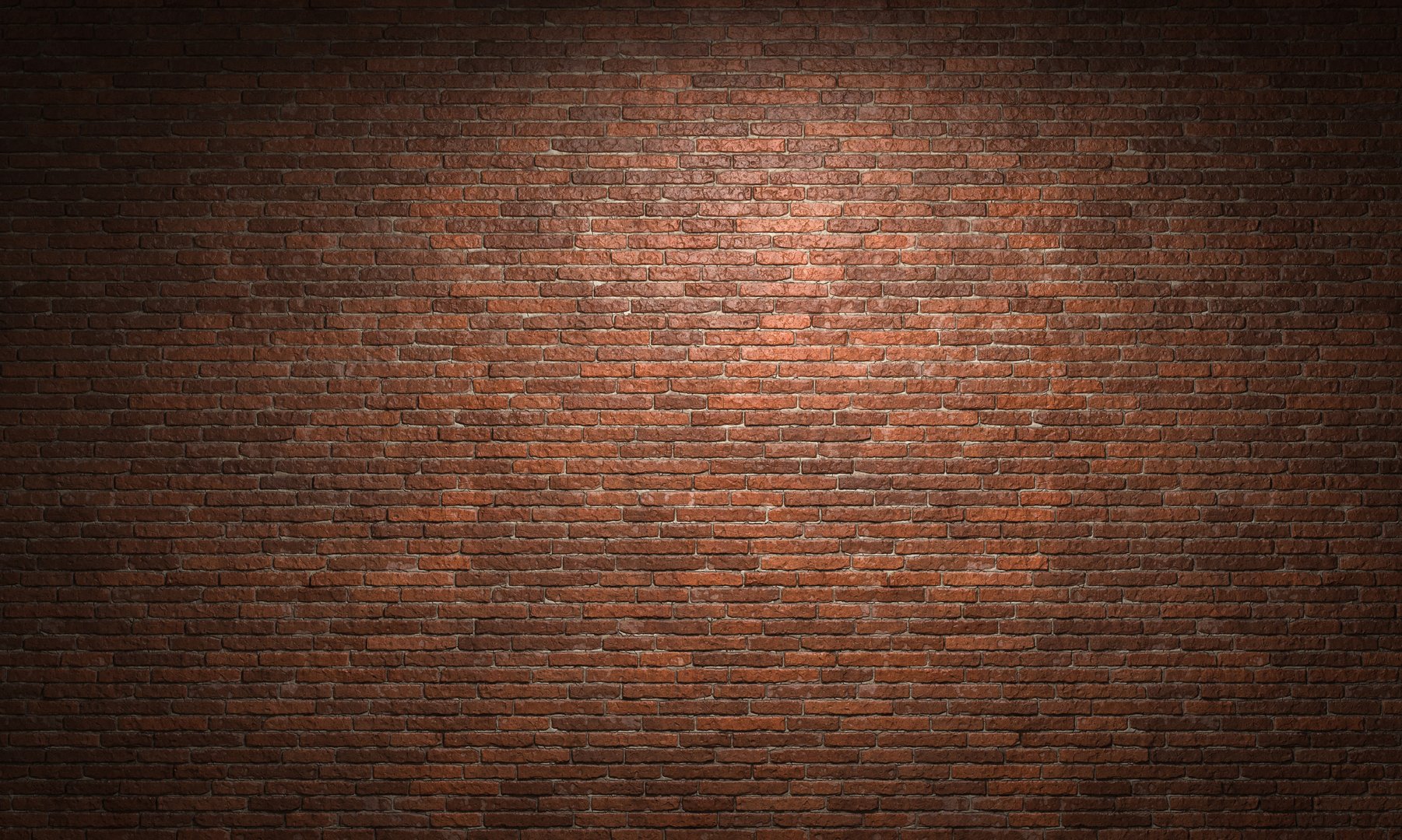 Red brick wall texture illuminated by a spotlight, creating a dramatic background