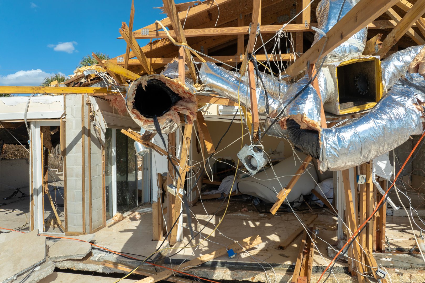 Storm surge severe damage to residential houses on ocean shore after hurricane landfall. Natural disaster consequences in Florida.
