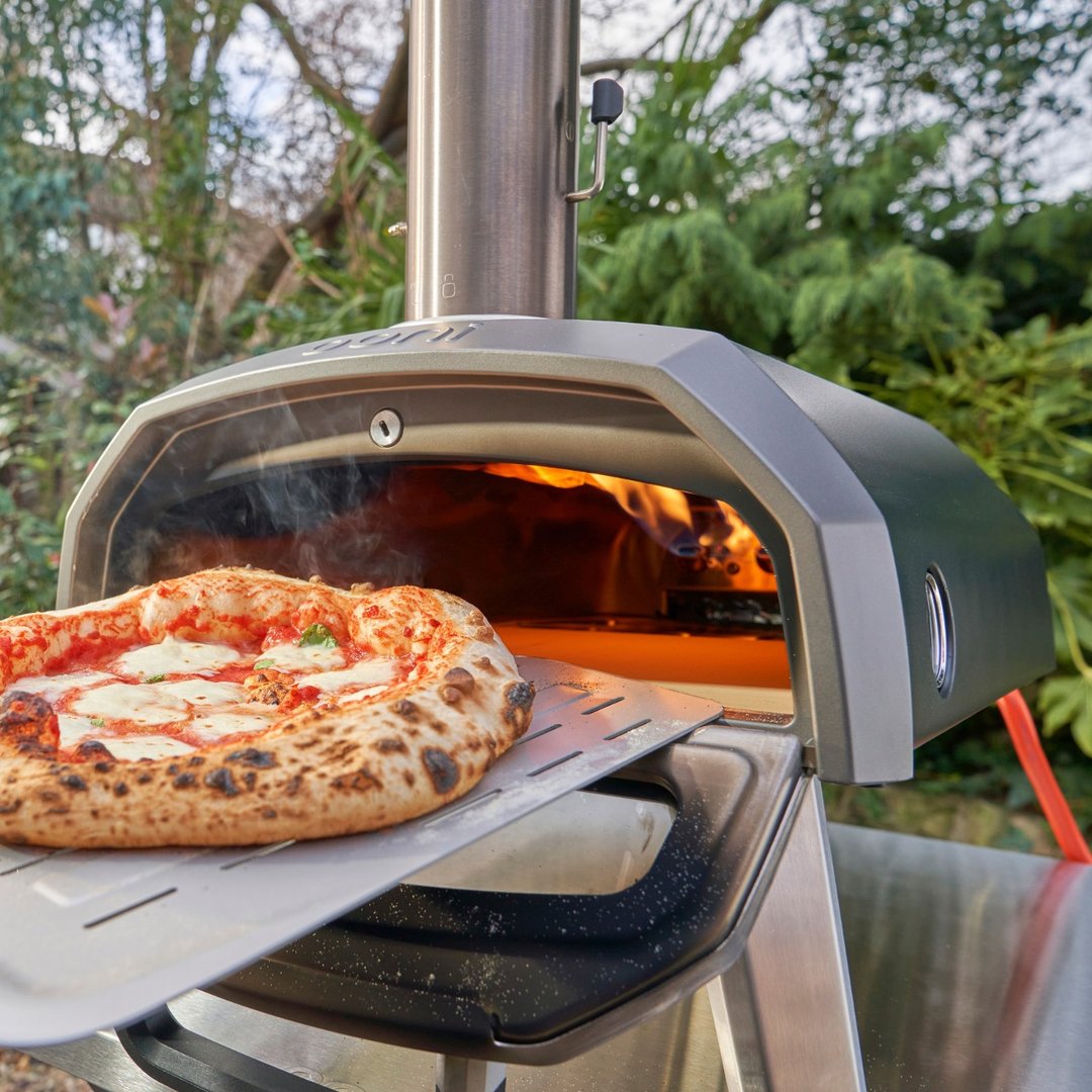 Outdoor wood-fired pizza catering buffet