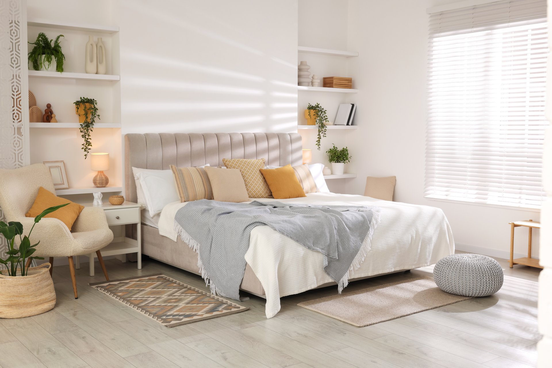 Comfortable large bed in beautiful room. Interior design
