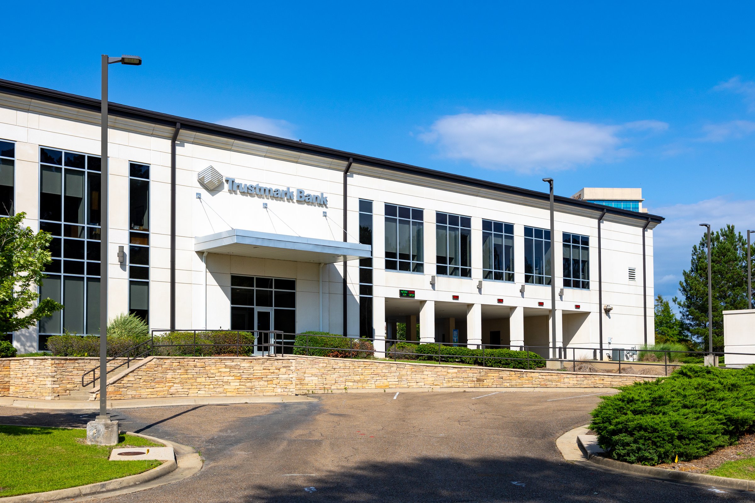 Ridgeland, MS - June 11, 2023: Trustmark bank building with sign and logo