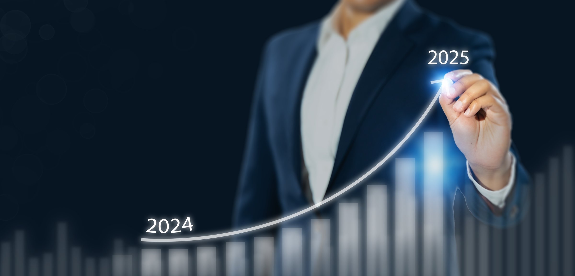Business growth forecast in 2025. A businessman projects an upward trend line from 2024 to 2025 over a bar chart, symbolizing anticipated growth, strategic planning and future financial progress.
