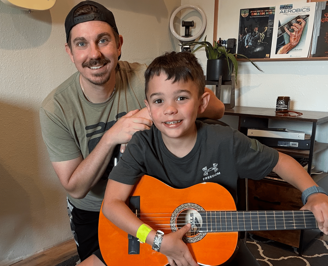 Teaching guitar student