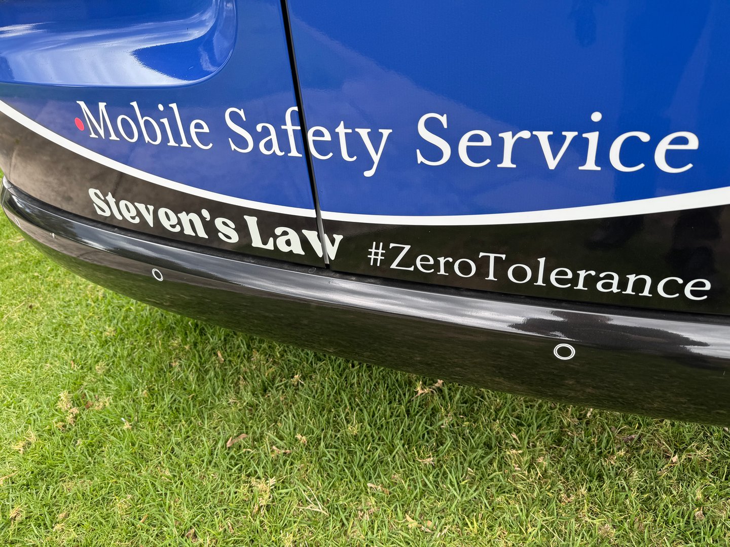 Liberty Test & Tag work van displaying Steven's Law support graphic