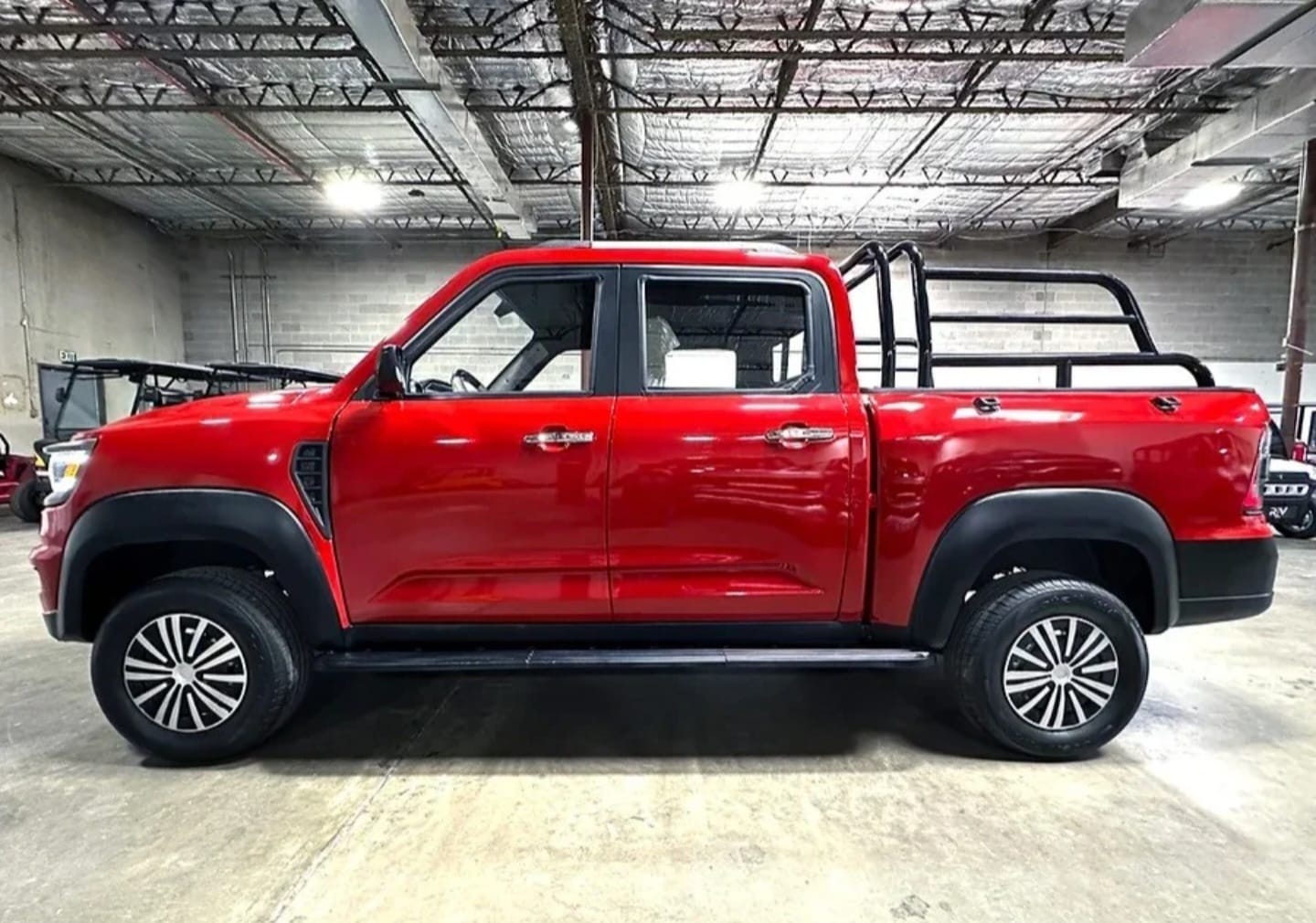 E Tronix Pick Up - Vista frontal del vehículo de carga