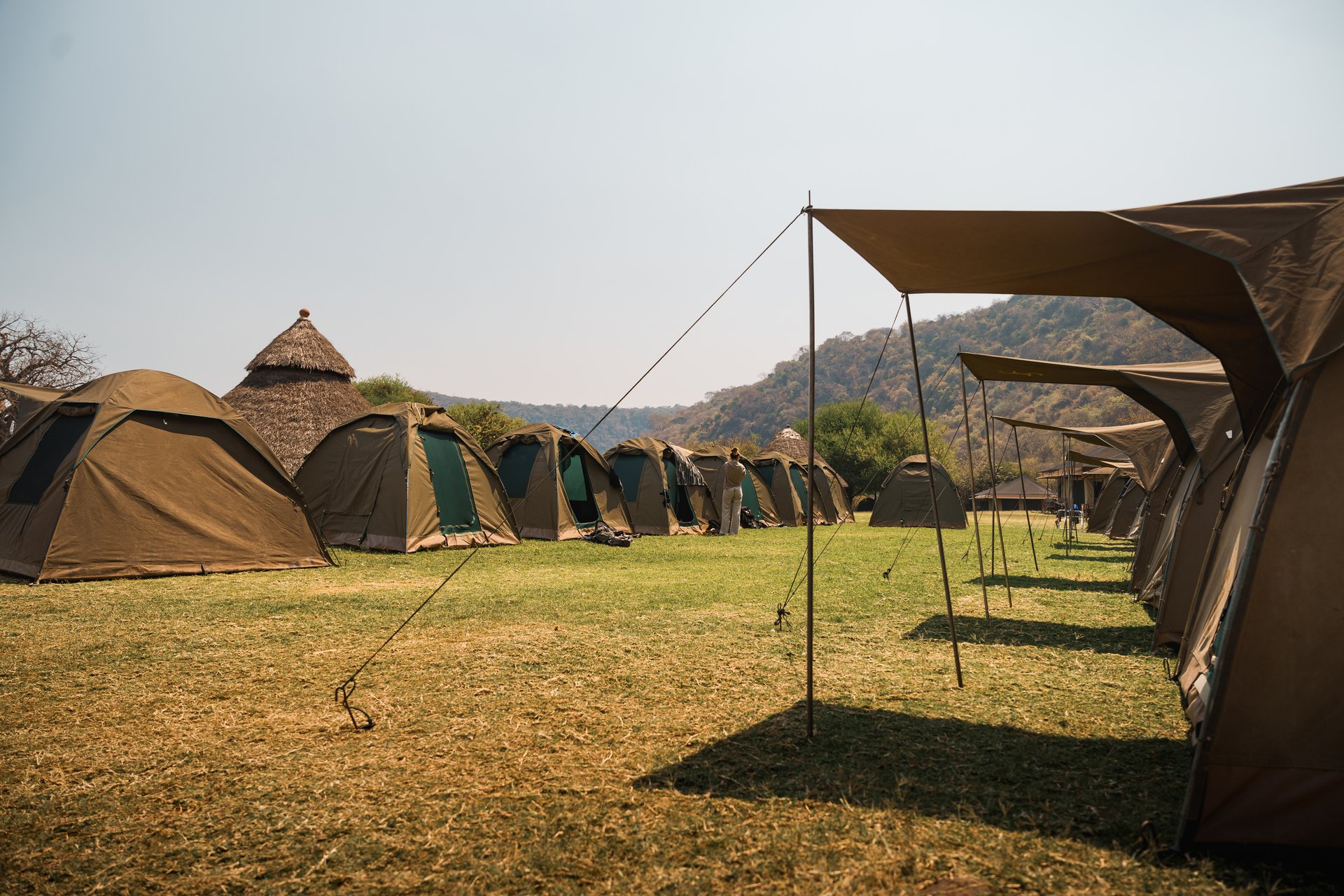 Luxurious tents offer comfort and immersion in the heart of the african savanna during a cultural trip and safari adventure in tanzania
