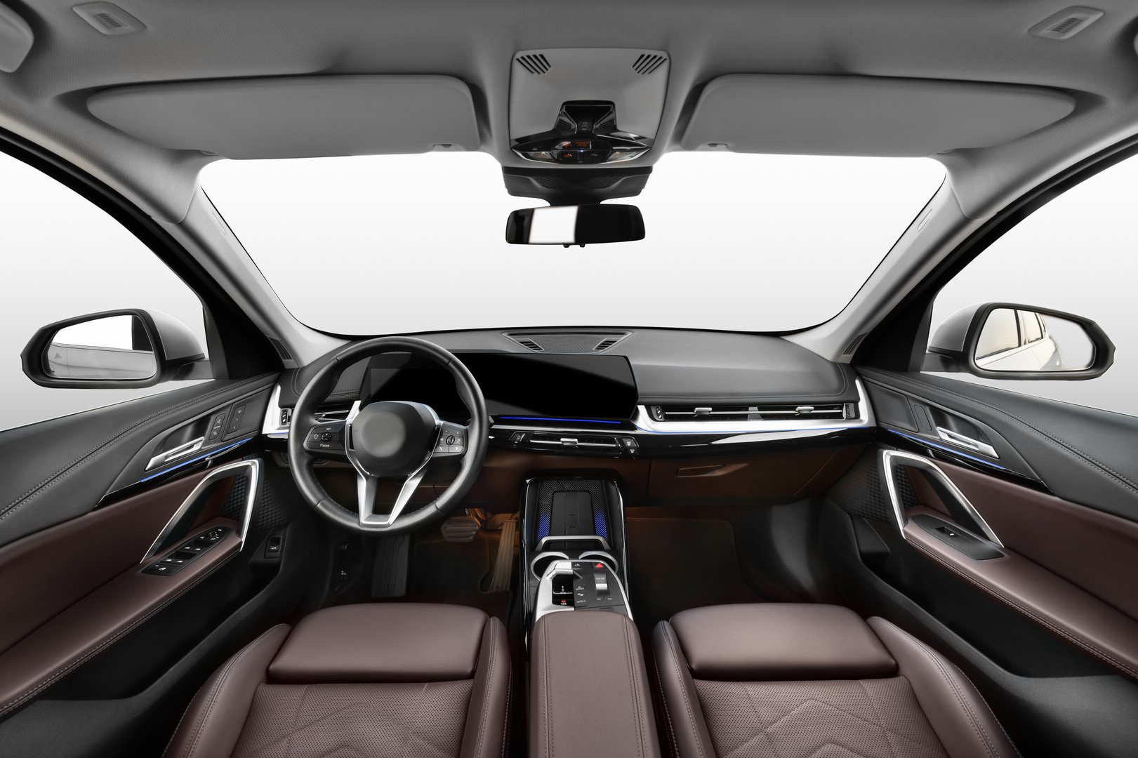 A detailed view of an electric SUV interior featuring a sleek dashboard, touchscreen display, and automatic controls, highlighting a luxurious and eco-friendly driving experience