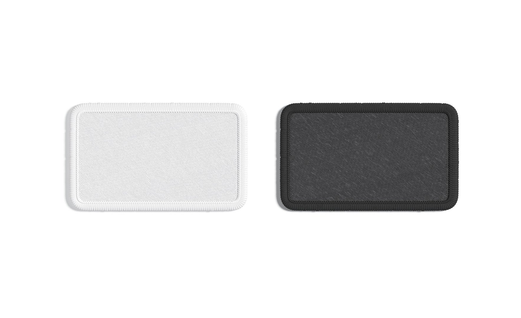 Blank black and white rectangle embroidered patch mockup, top view, 3d rendering. Empty textile round corners badge mock up, isolated. Clear symbolic embroidery label for shoulder straps template.