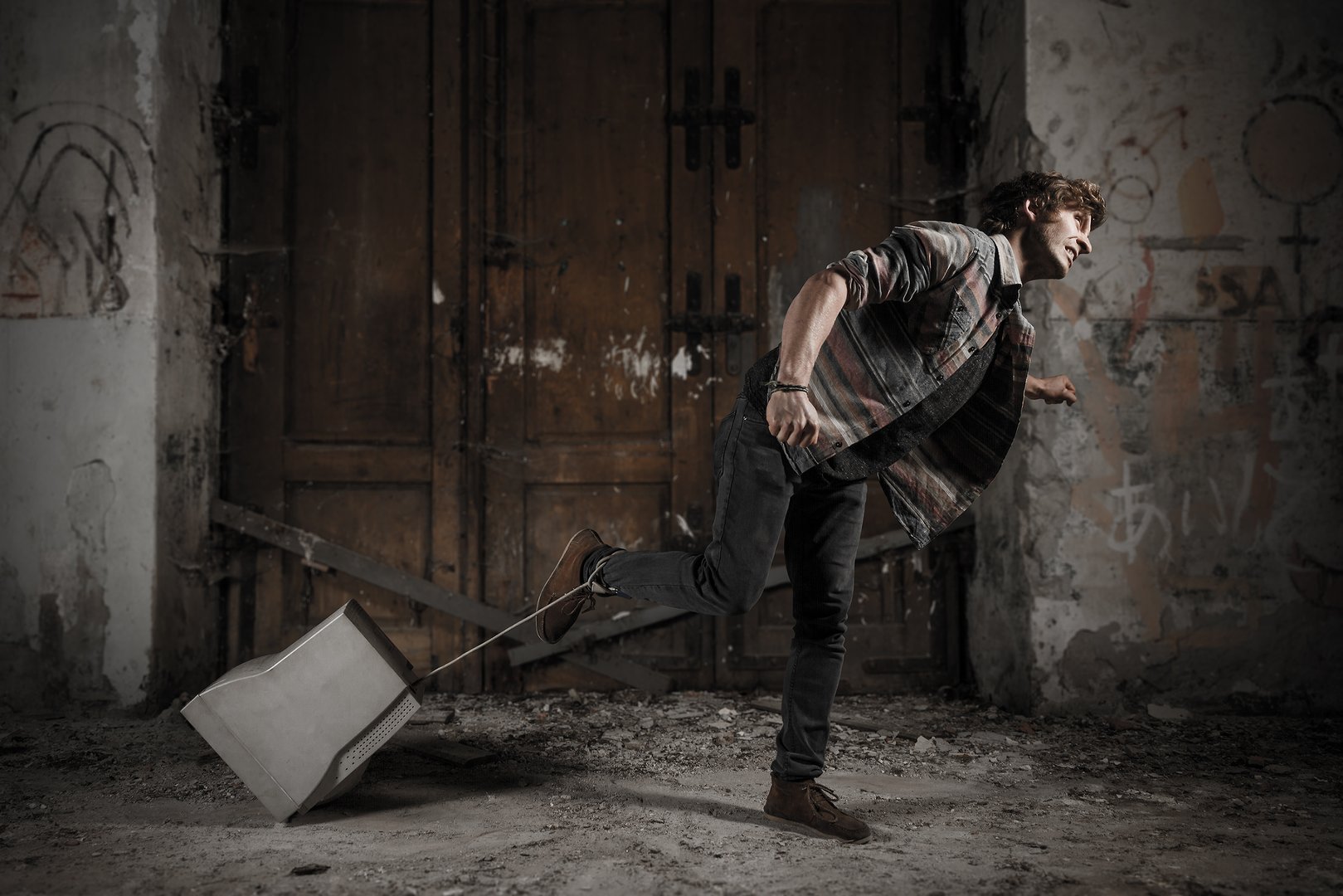 Modern menkind is running in a shackle