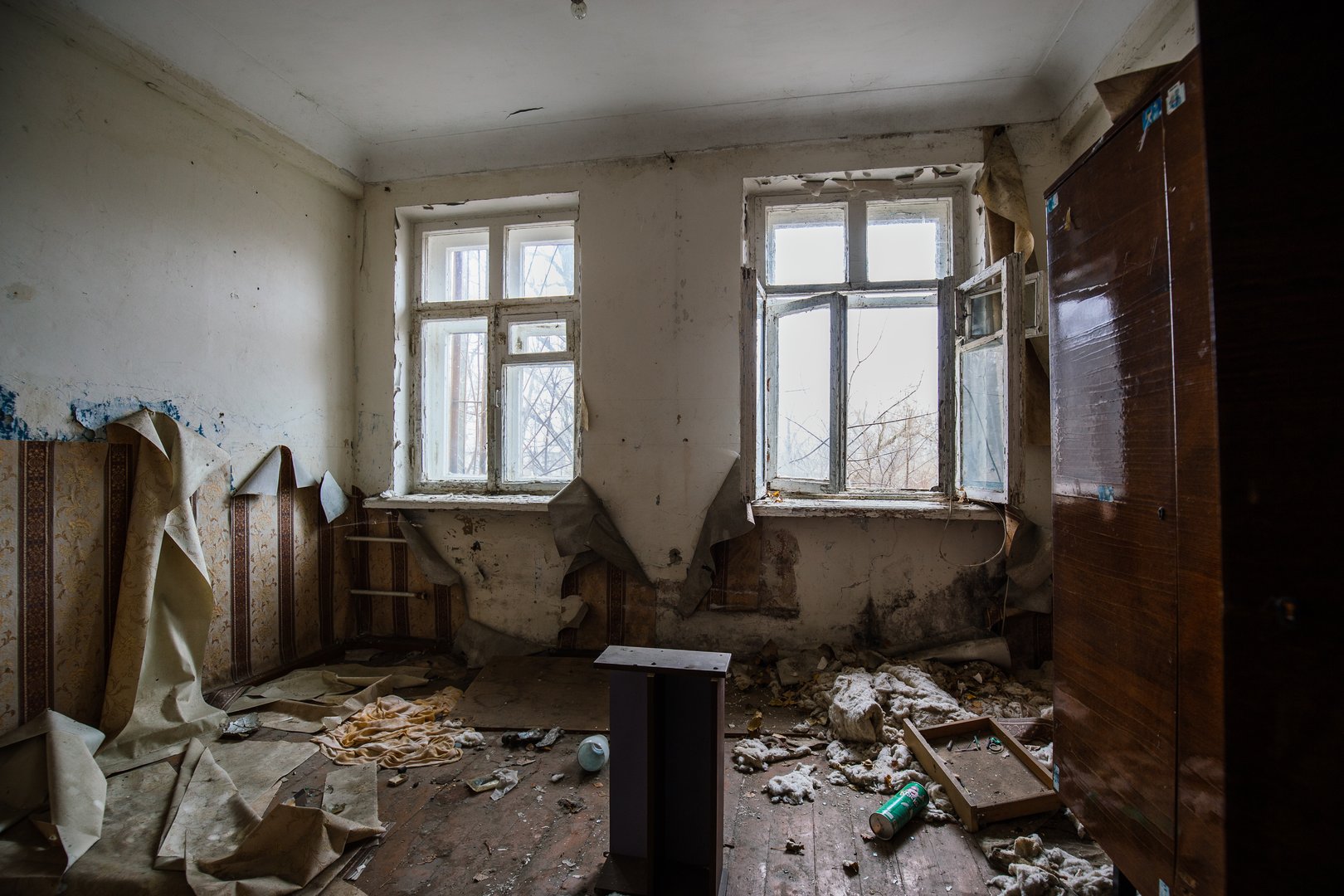 Interior of domestic room of abandoned forsaken apartment house