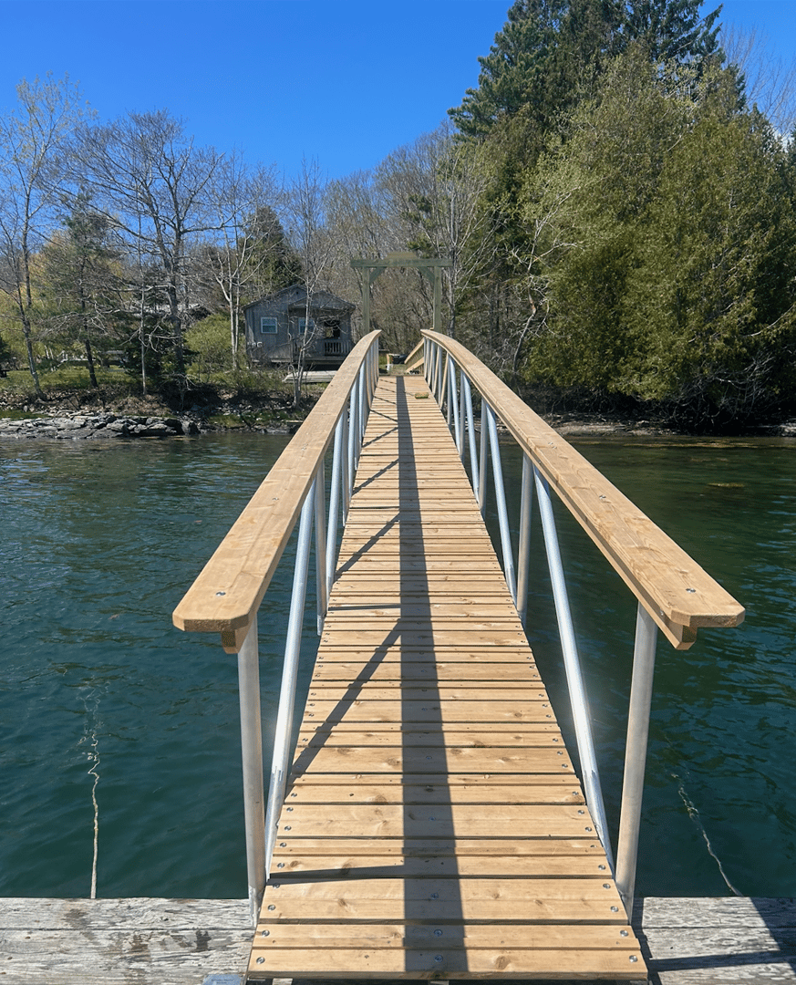Aluminum ramp installation by Midcoast Dock LLC