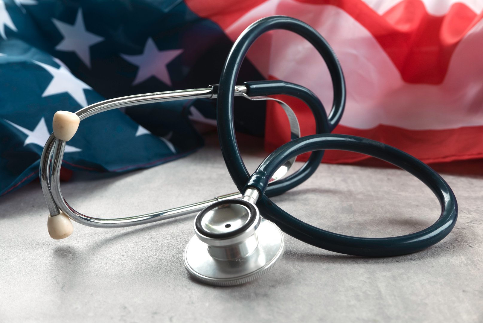 USA Flag and Stethoscope Representing Healthcare and Medical Services in the United States
