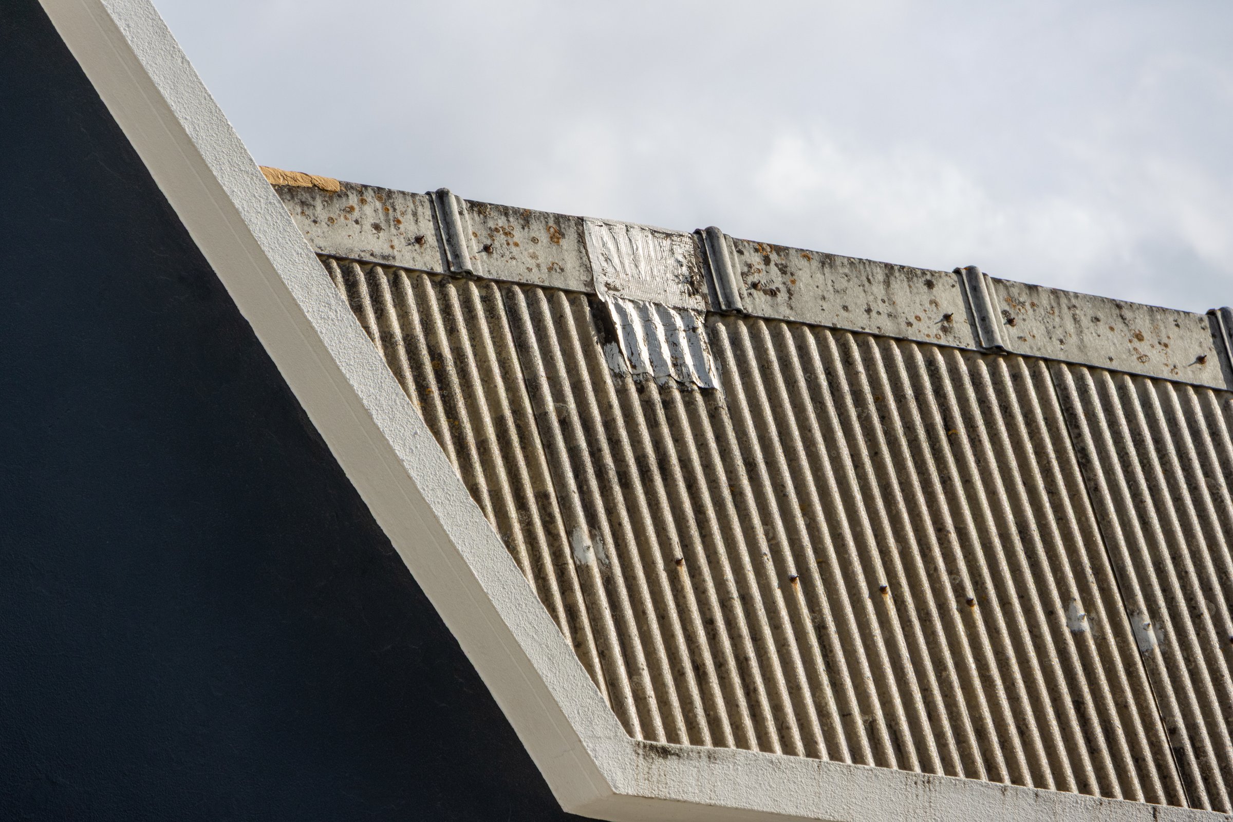 UV damaged cracked roof membrane surface showing wear and deterioration from Dubai sun exposure