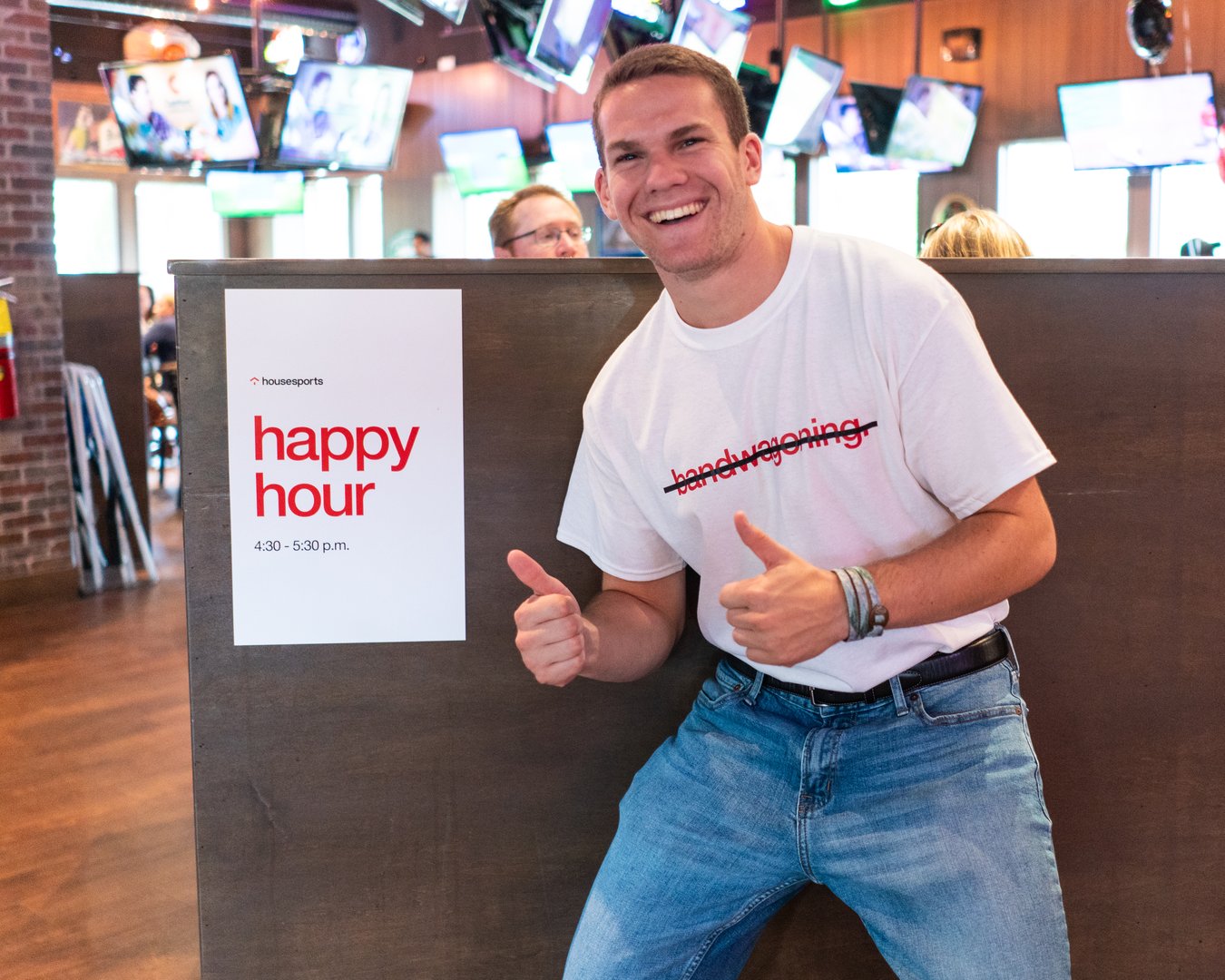 Excited sports fans cheering at a stadium