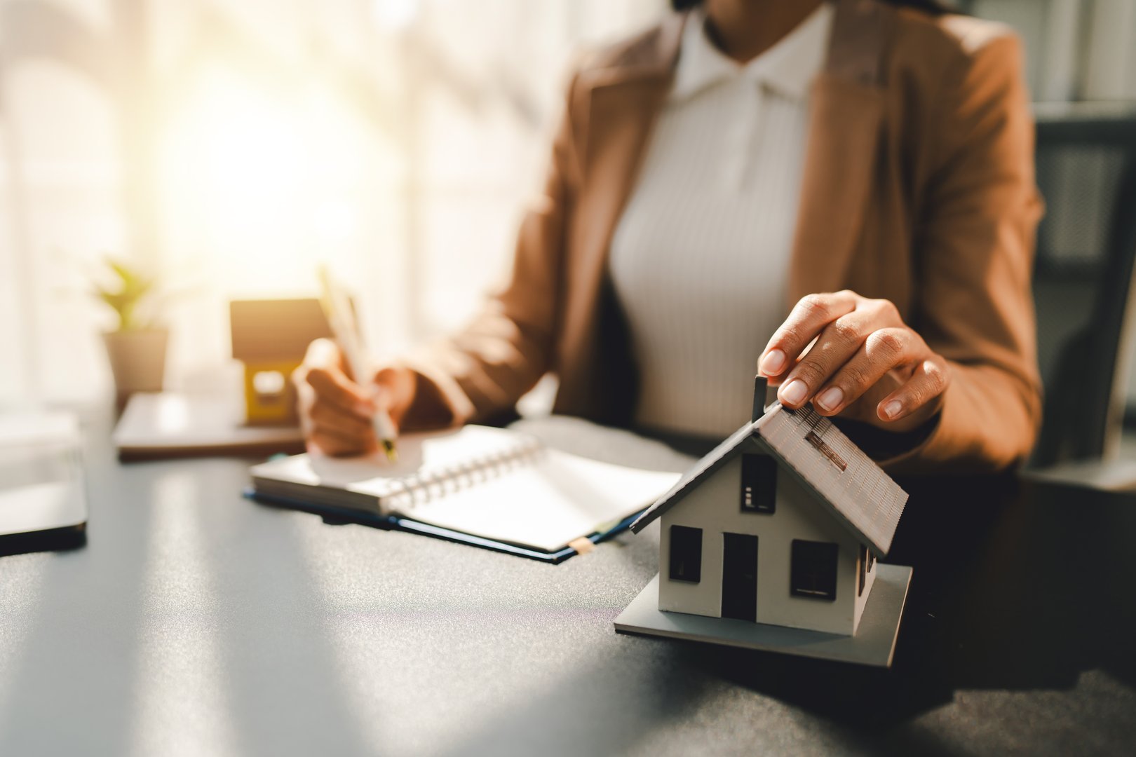 Real estate agent with mortgage loan contracts