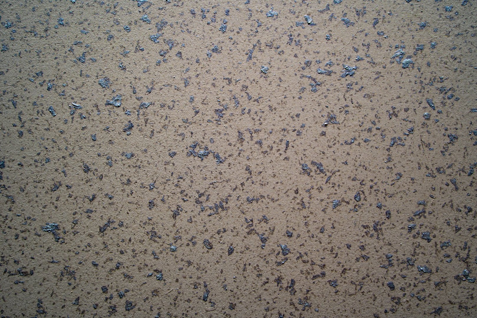 Textured background. Decorative plaster of walls, external finishing of the facade. The texture is beige