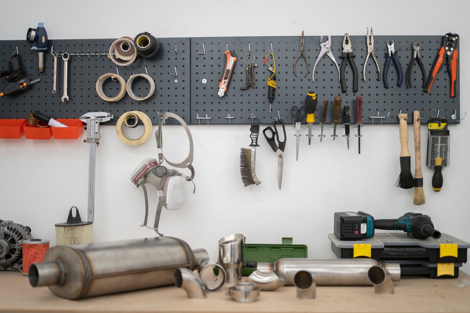 A well-organized workspace in a car service setting showcases various tools and equipment