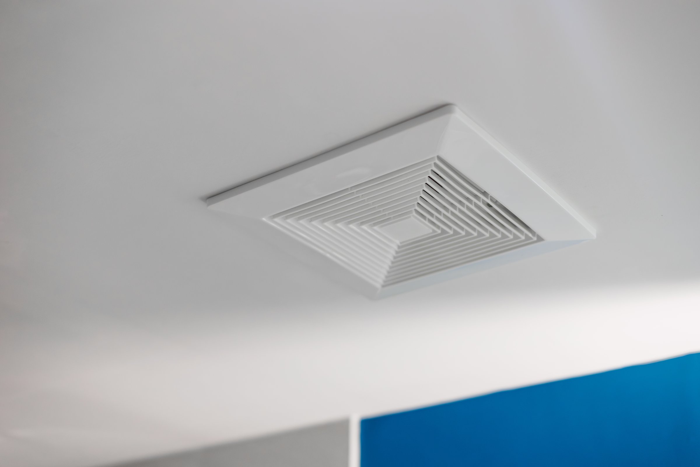 Restroom air ventilation. Toilet moisture ceiling ventilation fan duct in bathroom modern clean new