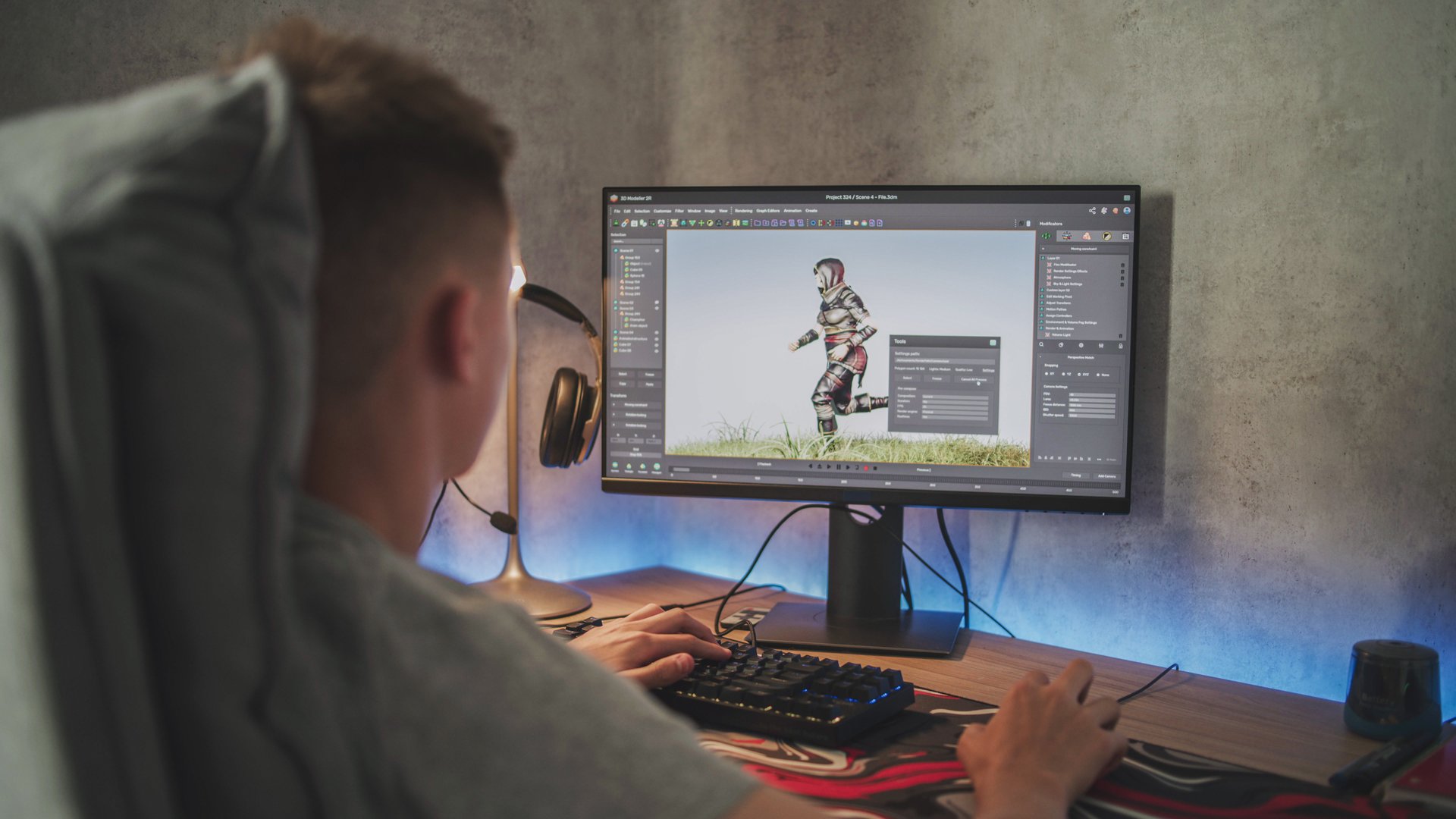 Young designer creates 3D model and animation of game character using computer. Interface of professional 3D modeling software. Teen boy working on freelance project on PC at home. Game development.
