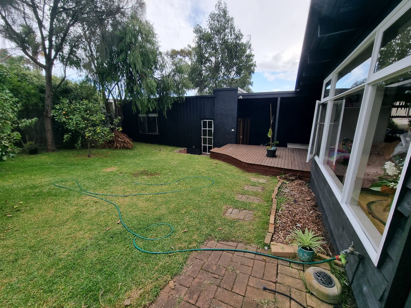 Contemporary family home exterior finished project by Quality Painting Group