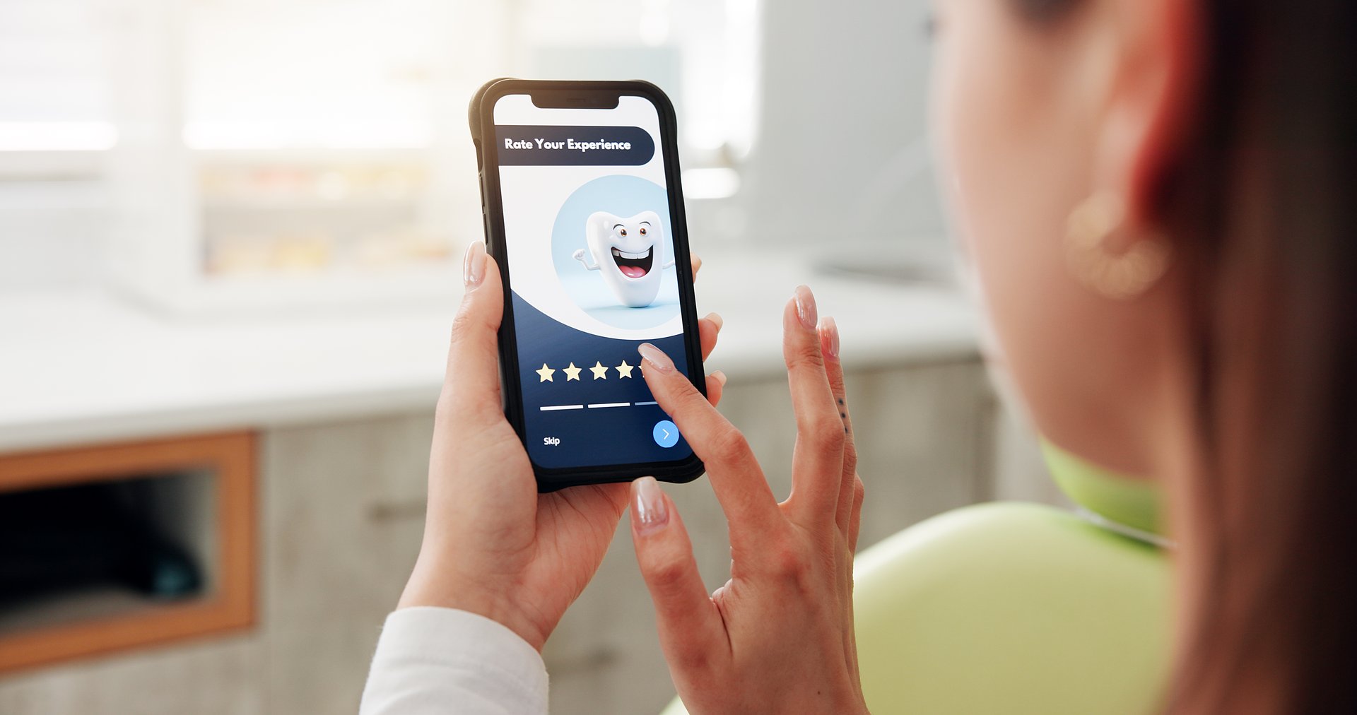 Hands, woman and phone screen in dentist office for consultation, inquiry and service reviews. Person, patient and mobile app for dental website, appointment survey and information for oral treatment