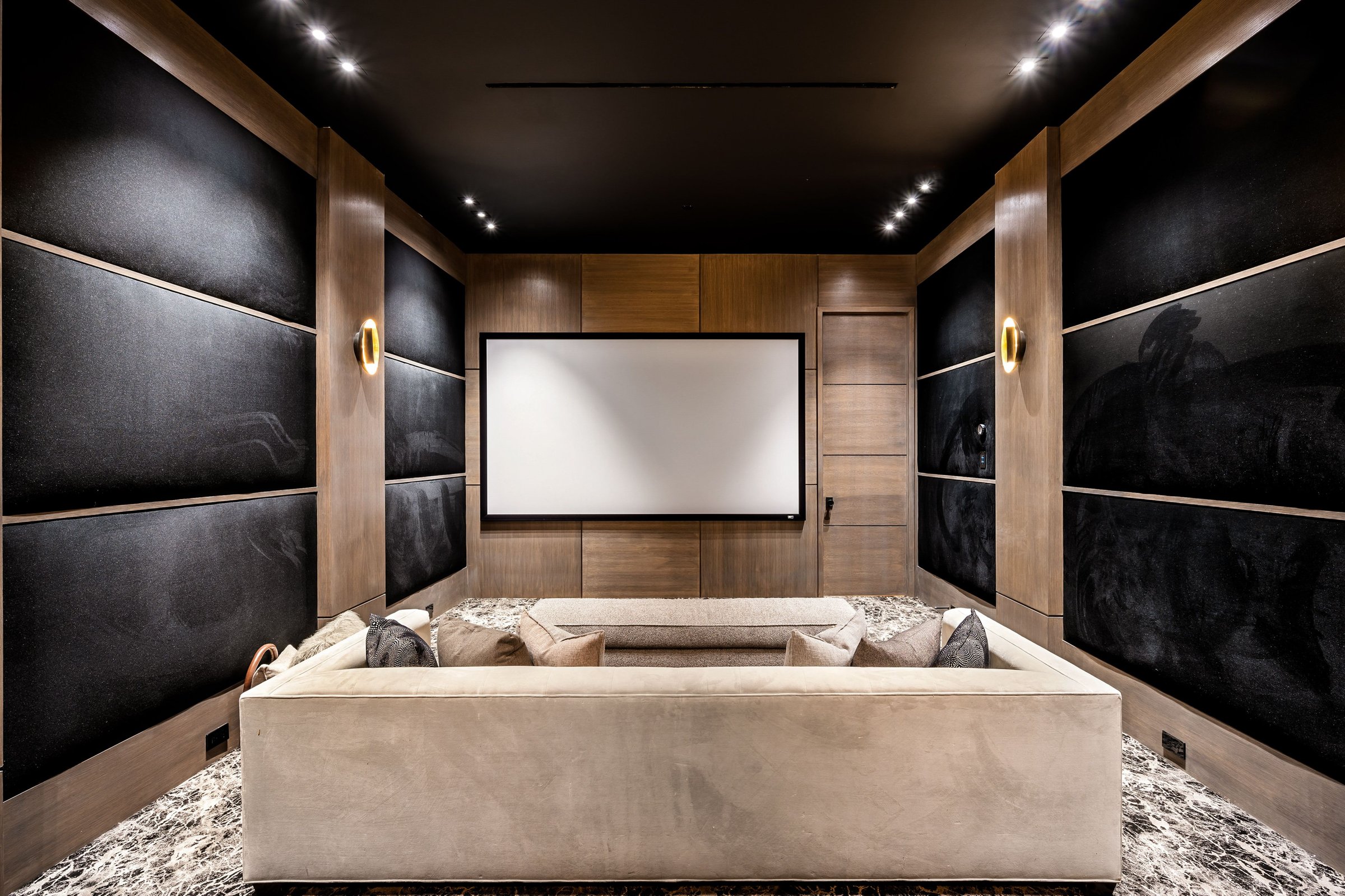 Modern home theater room with comfortable seating